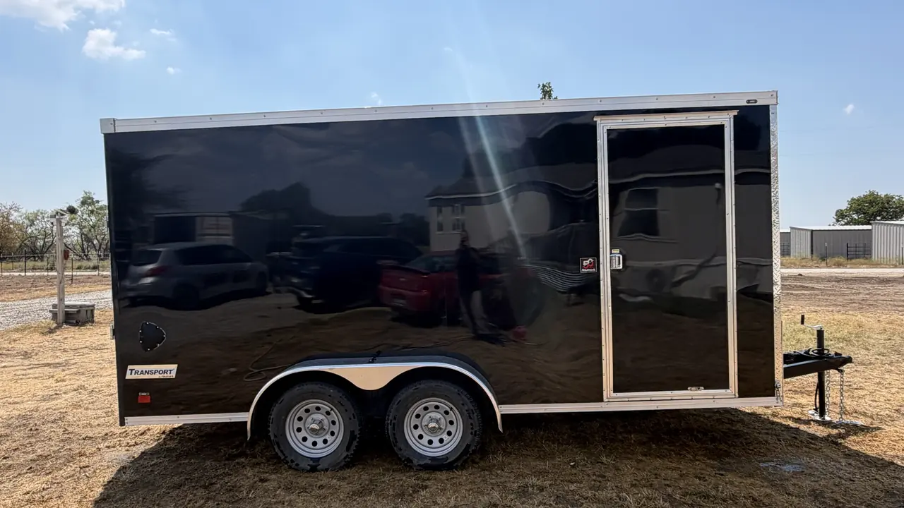 APEX Enclosed Cargo trailer — side profile with the curbside door.