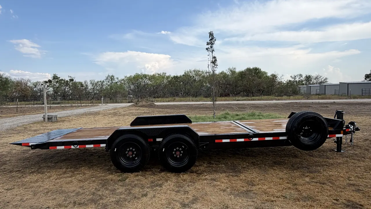APEX 22' Non-Hydraulic Tilt trailer — full side profile with the tilt deck down.